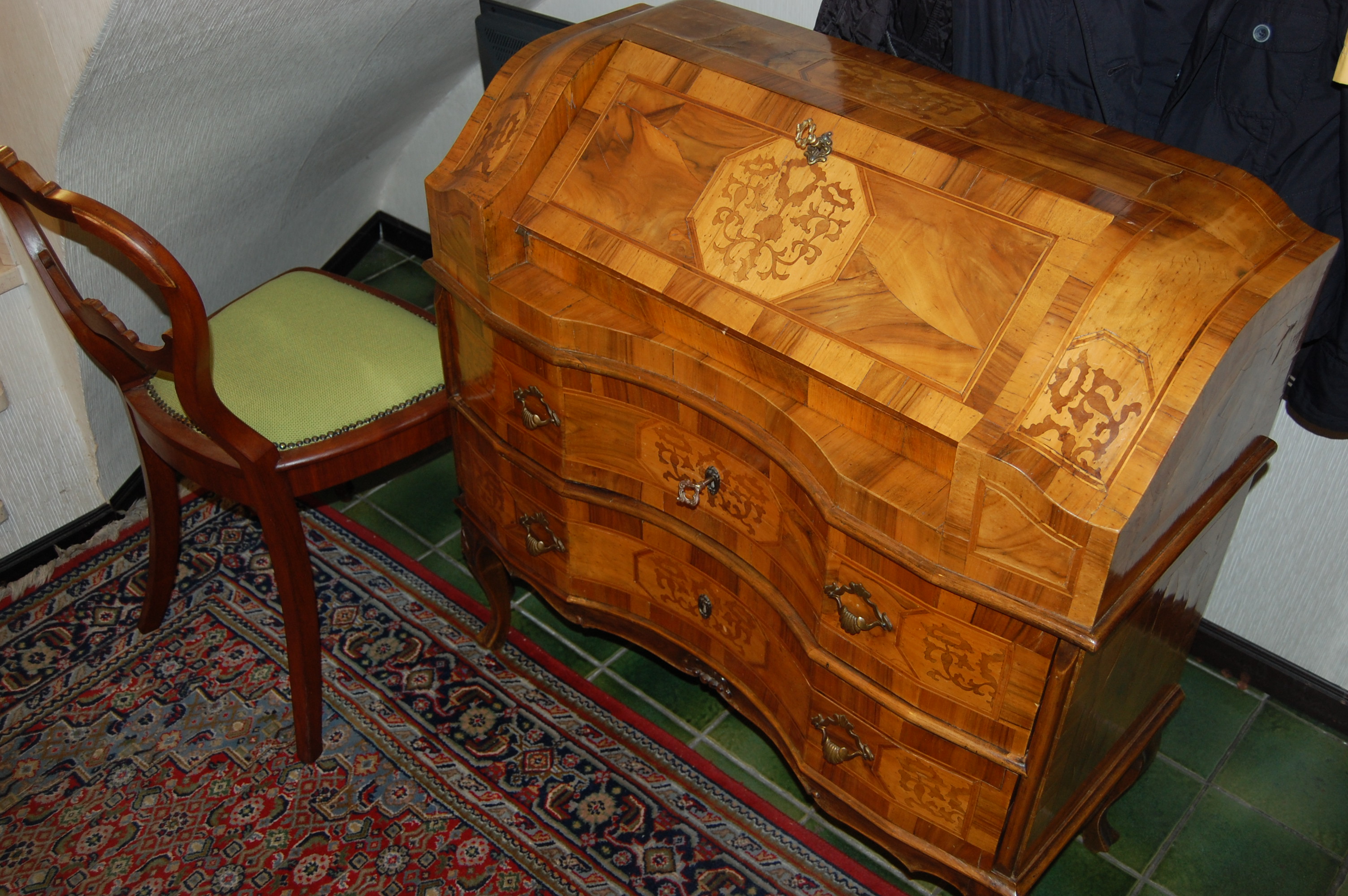 A small veneer baroque style desk