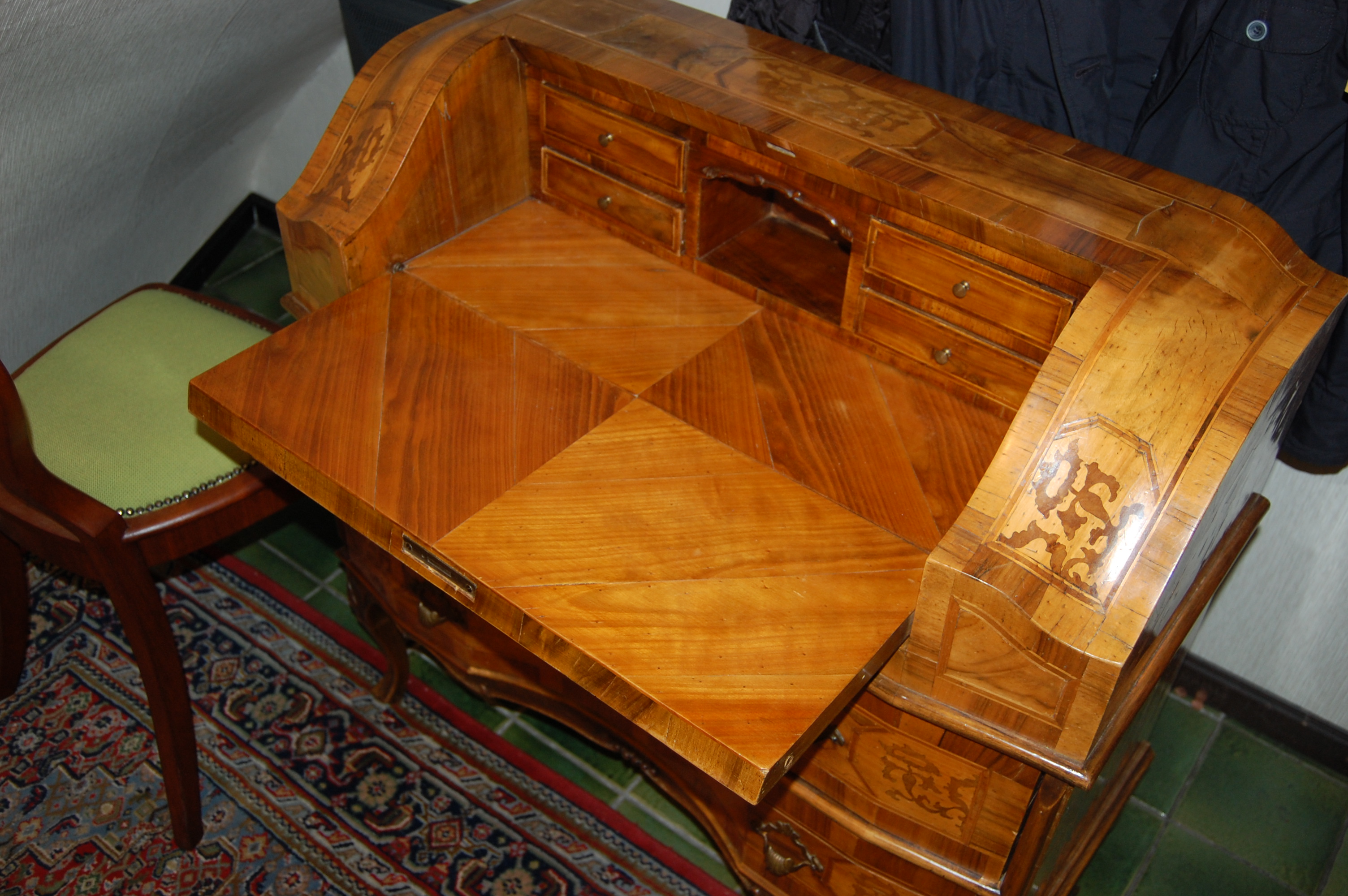 A small veneer baroque style desk 