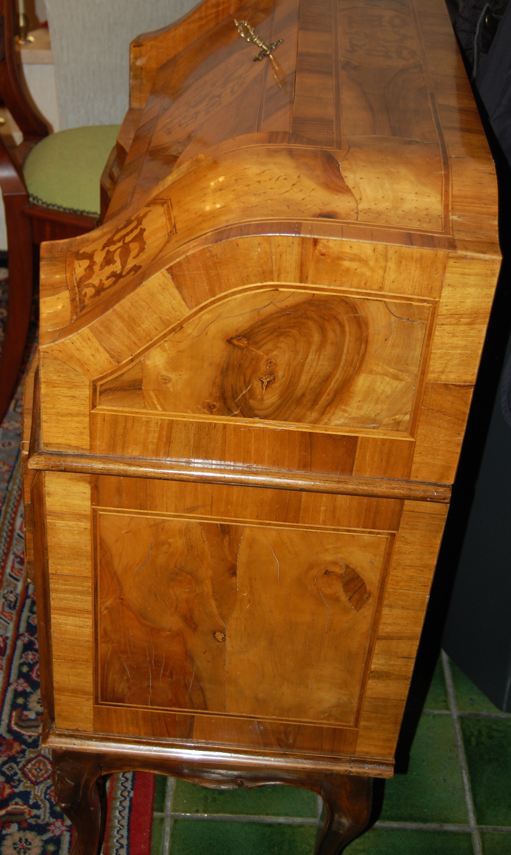 A small veneer baroque style desk 