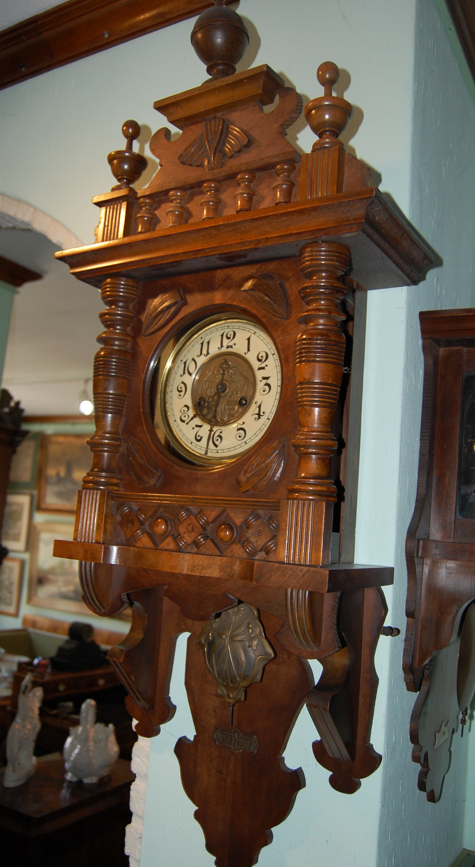 A nice 1900 mechanical wooden wall clock Height: 39 in. (100 cm) 
