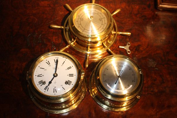 A German set of a brass ship clock, barometer, hygrometer by 'Wempe', Germany